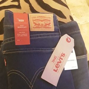 Levis 515 Bootcut Mid Rise Jeans
